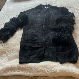 Open front cardigan with fringe detail on arms